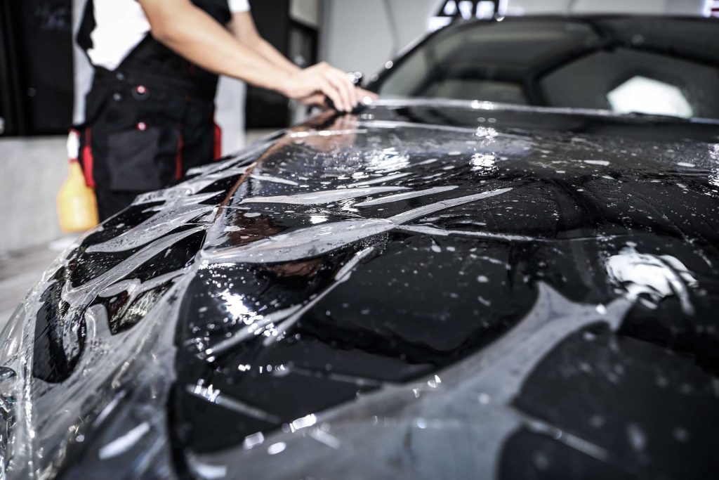 Installing paint protection film on a vehicle